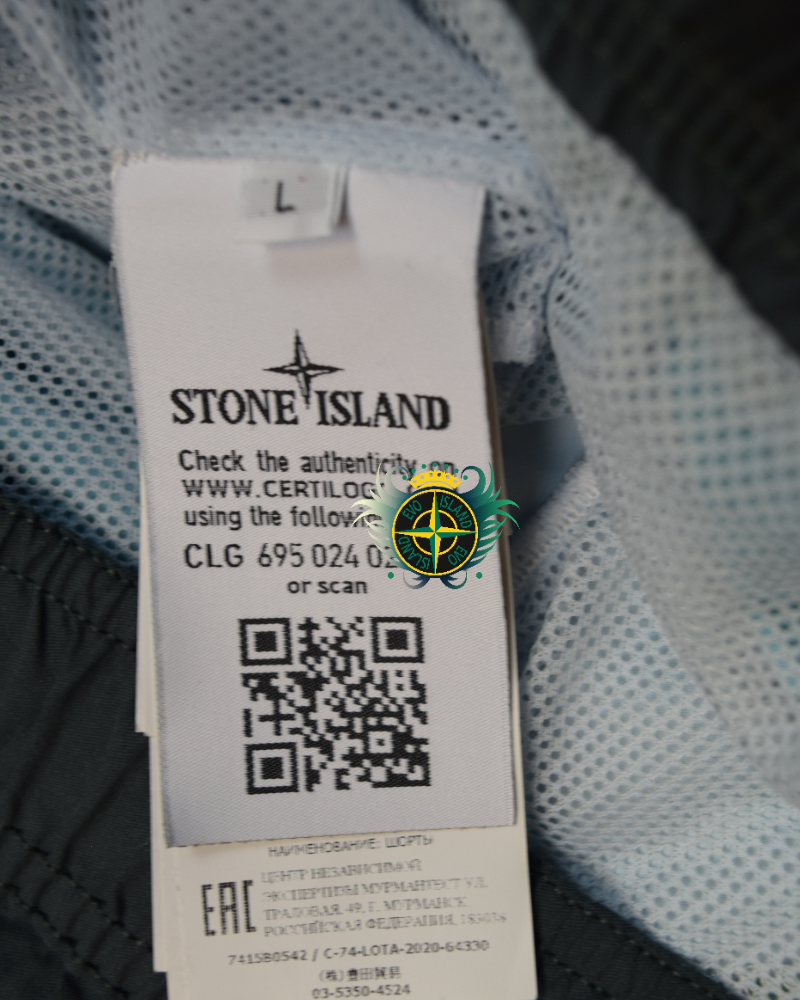 Stone Island Gradiant fade swim shorts Green detail view
