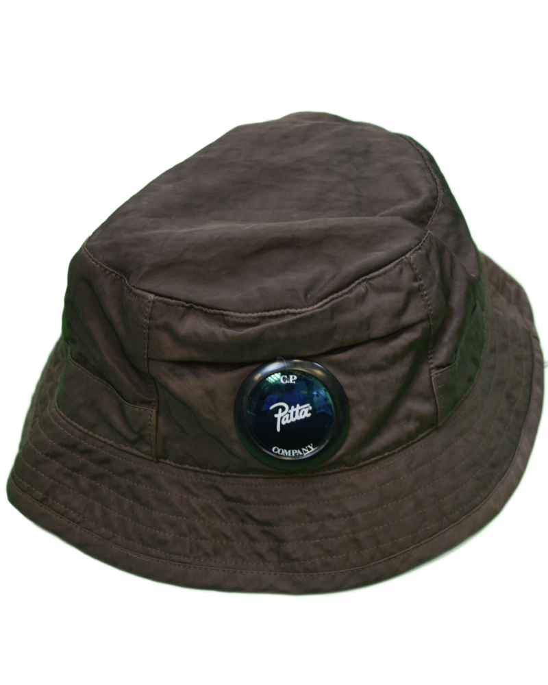 C.P Company x Patta Lens Bucket Hat Brown front view