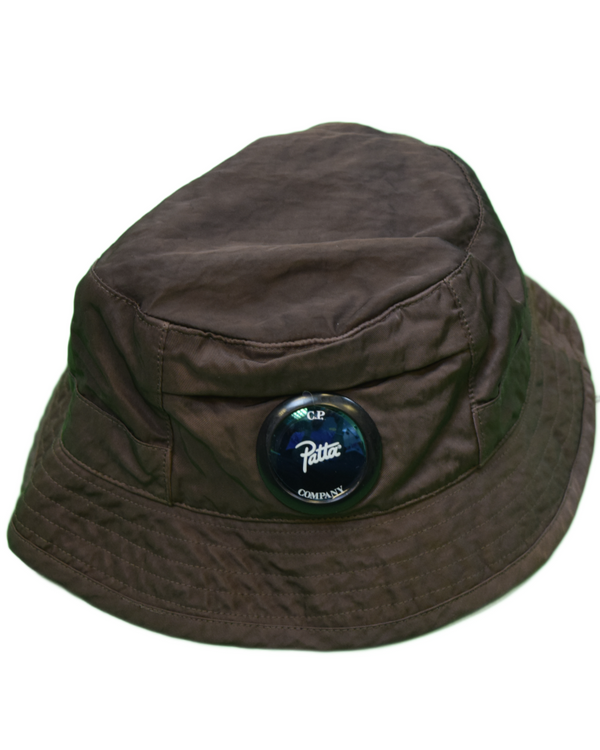 C.P Company x Patta Lens Bucket Hat Brown front view