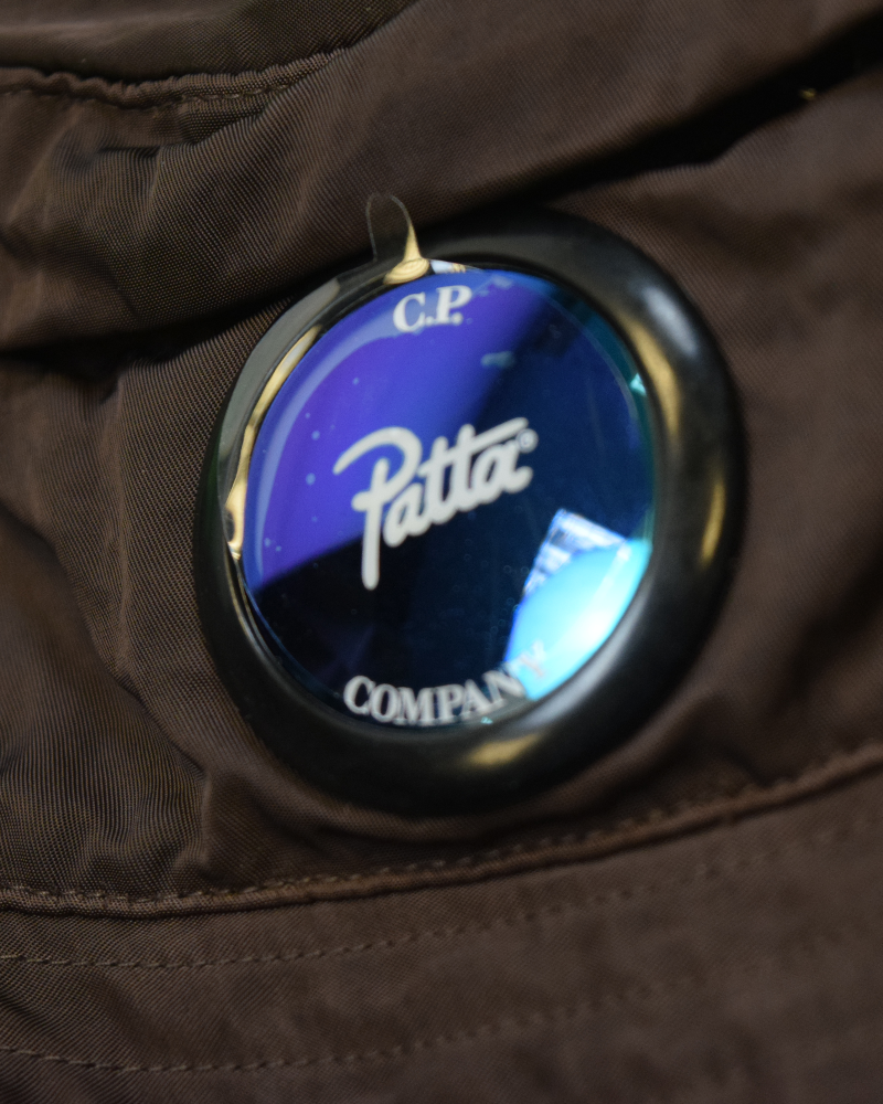 C.P Company x Patta Lens Bucket Hat Brown detail view